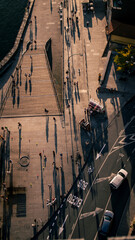 Long shadows of people walking, birds-eye view