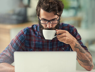 Man, laptop and coffee in office for agency with online connection, reading email and web design...