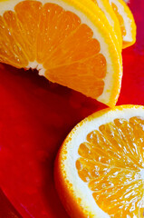 sliced oranges close-up. Vertical photography. Healthy natural food with vitamins.