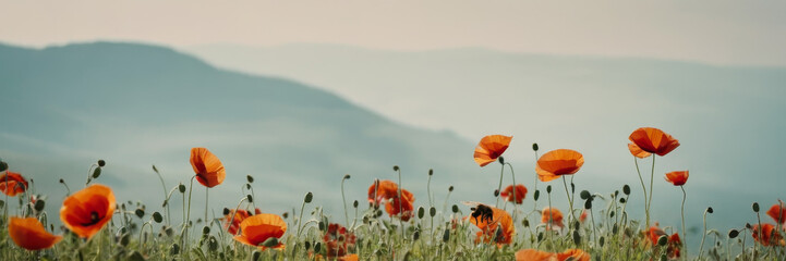 A field of vibrant orange flowers stretches towards majestic mountains in the background under a clear blue sky - Powered by Adobe