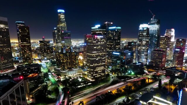 Time Lapse Lockdown Shot Of Sparkling Modern Buildings In City Against Clear Sky At Night - Los Angeles, California