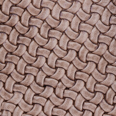 Texture of genuine Braided leather. Fashion trend leather background, copy space, substrate composition use