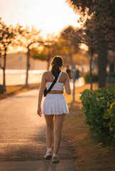 woman walking in the park miami 