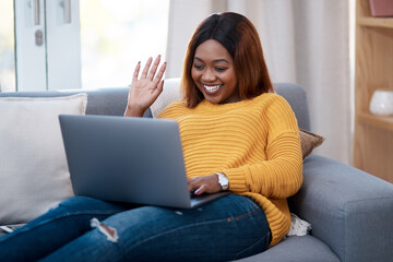 Home, wave and black woman with laptop for video call, greeting and online meeting in lounge. African person, apartment or girl with computer, tech or virtual chat with network or internet with hello