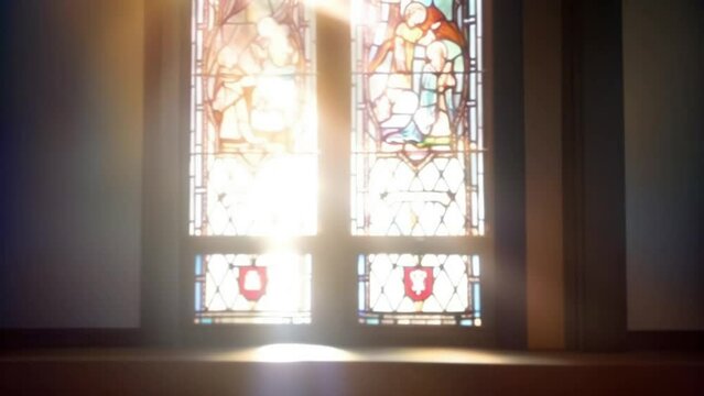 A stained glass window inside a church has beautiful sunlight shining through for a Christianity, faith based or salvation concept. Real photo was used and animated with artificial intelligence.