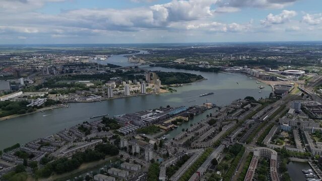 Aerial of city centre of Rotterdam with the urban skyline of one of europe's biggest harbors in Rotterdam, the Netherlands. Central station with trains.