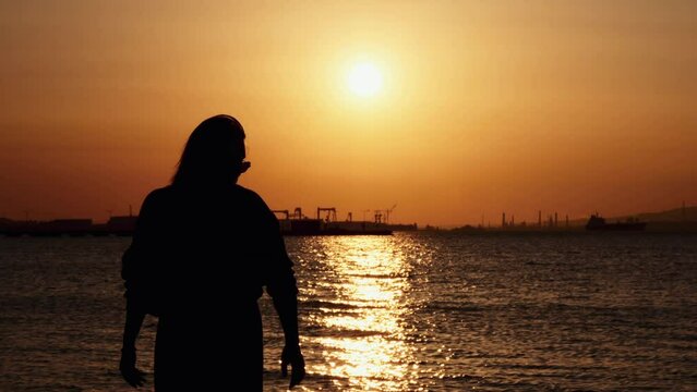 Dancing Woman Silhouette in Sunset Light