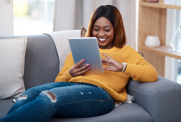 Fototapeta na wymiar Tablet, search and happy black woman on sofa with social media, reading or website scroll at home. Digital, research or student with streaming app for sign up, online course or elearning registration