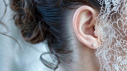 The delicate whorls of the outer ear resemble a piece of delicate lace adding a touch of elegance to the human form. .