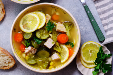 Vegetable soup with baked chicken and lemon .top veiw .style hugge - 787498733