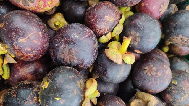 exotic mangosteen fruit in the market store.