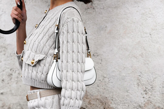 Milan, Italy - February, 22, 2024: woman wears Prada Cleo bag, fashion blogger outfit details