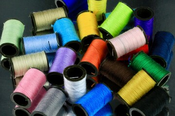 Spools of colorful thread for sewing crafts
