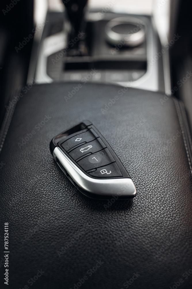 Poster modern car key inside the car