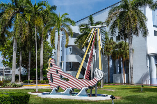 Miami Beach, FL - April 3, 2024: The Mermaid outdoor sculpture by Roy Lichtenstein, beside the Fillmore Theater, is composed of concrete, steel, polyurethane, enamel, palm tree, and water.