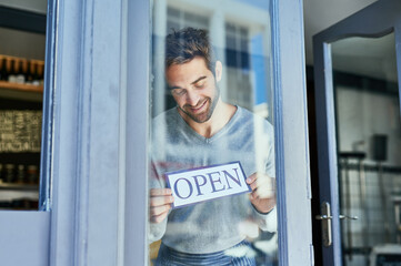 Happy man, window and open sign in cafe for small business with welcome, service industry and...