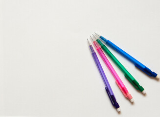 Four mechanical pencils on a white background
