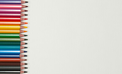 Row of bright coloured pencils