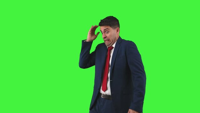 Remorseful Businessman with Hand on Temple Expressing Guilt Green Screen Chroma Key