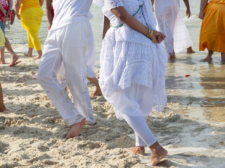 Umbanda supporters are seen dancing during a tribute to iemanja on Itapema beach in the city of...