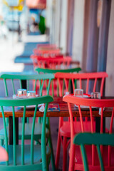 table and chairs in a restaurant colors Miami Beach 