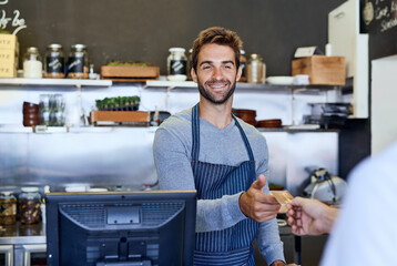 Cashier, smile and credit card for payment, financial transaction and service in coffee shop....