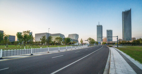 Tranquil Urban Roadway at Sunset in the City