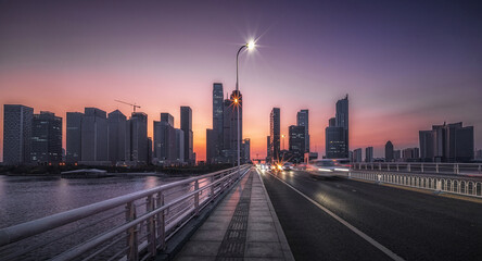 Urban Evening Glow on a Bustling City Bridge