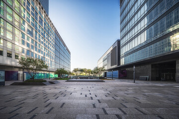 Modern Office Buildings Courtyard with Blue Sky - obrazy, fototapety, plakaty