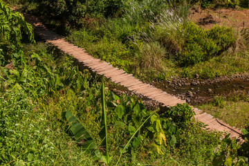 Foot bridge in Lakkham-Mai village near Luang Namtha, Laos