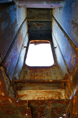 Rusty shipwreck lying on the seabed of the dried-up Aral Sea in Moynaq (or Muynak), a former...