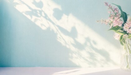 Bright light pastel pale blue room wall flatlay as background. Abstract natural floral shadow patterns. White wooden floor.