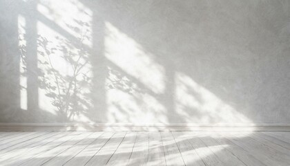 Bright white room wall flatlay as background. Abstract natural floral shadow patterns. White wooden floor.