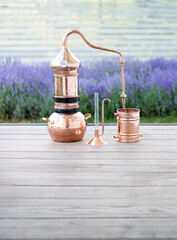 Distillation of lavender essential oil and hydrolate. Copper alambik for the flowering field. - 787568966