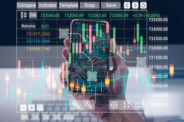 trader use smartphone trading stock exchange graph money of block chain stock market cryptocurrency...