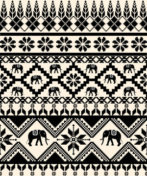 Black cross stitch with geometric pattern and elephant on vintage yellow background.
