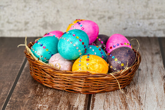 Easter eggs in a brown rustic vintage basket