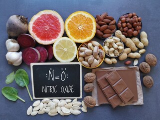 Foods to increase nitric oxide level naturally. Nitric oxide boosting superfoods for optimal health. Nitric oxide rich food with chemical formula of nitric oxide. Fruit and vegetable high in nitrates.