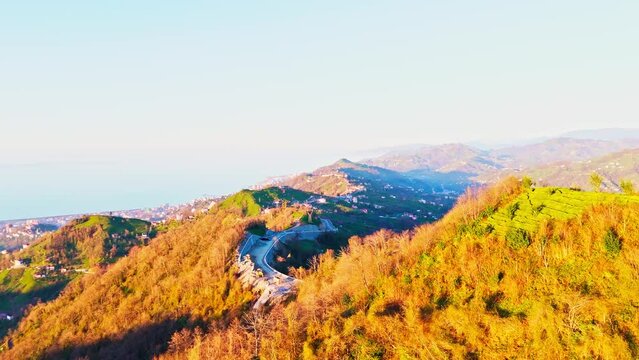 a mountain with a road going up the side