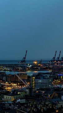 Evening timelapse of Genoa (Genova) port, Italy with thunderstorm and lightning strikes. Horizontal camera pan