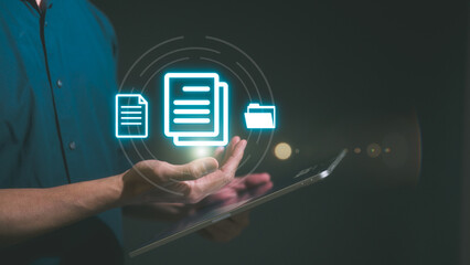 Document data system Report HR technology Concept: Businessman Manager using digital tablet holding icons working with virtual documents reports files icon
