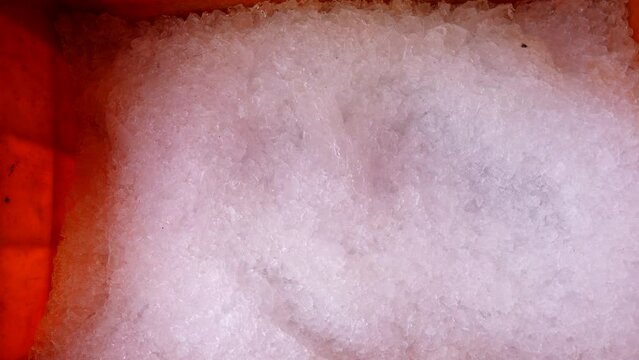 Ice crushed and stored in box for putting fish