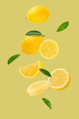 Falling lemon with half and leaves on yellow background. - 787617916