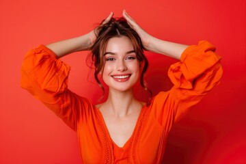Obraz na płótnie Canvas Close up photo of pretty cheerful lady stylish orange clothes arm direct empty space beauty procedure isolated on one color background - generative ai