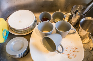 dirty dishes in sink