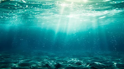 Fotobehang View of the ocean floor with sunlight breaking through © Margo_Alexa