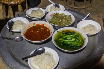 Dinner in a village house in Namkhon village near Luang Namtha town, Laos