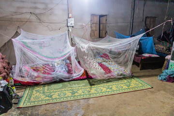 NAMKHON, LAOS - NOVEMBER 18, 2019: Sleeping area in a village house in Namkhon village near Luang Namtha town, Laos