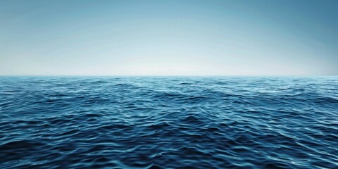 Obraz premium The ocean is calm and peaceful, with no signs of any activity. The water is a deep blue color, and the sky is clear and blue. The scene is serene and tranquil