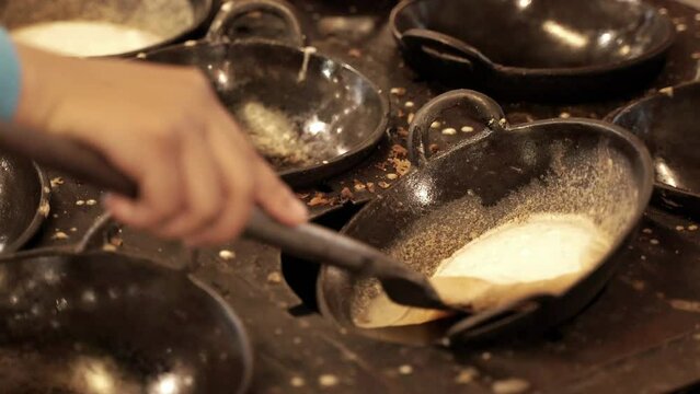 Serabi is being removed from the steamer, typical Indonesian food serabi, street food.